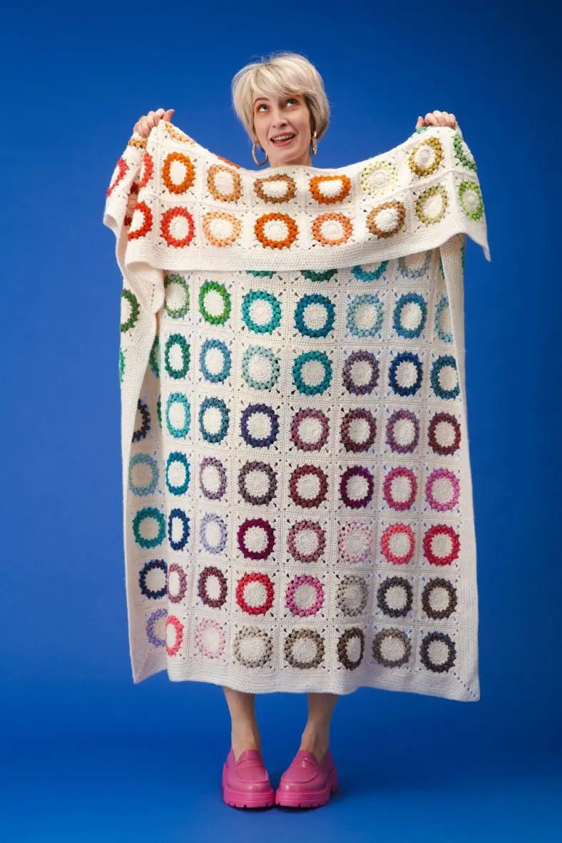 Pop Spots crochet rainbow blanket in Stonewashed