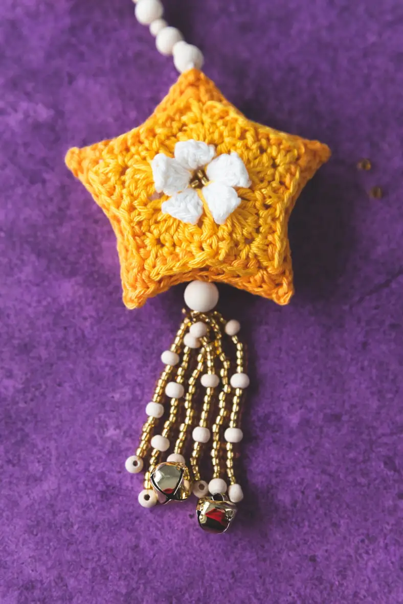 Close up of tassel on winter star garland